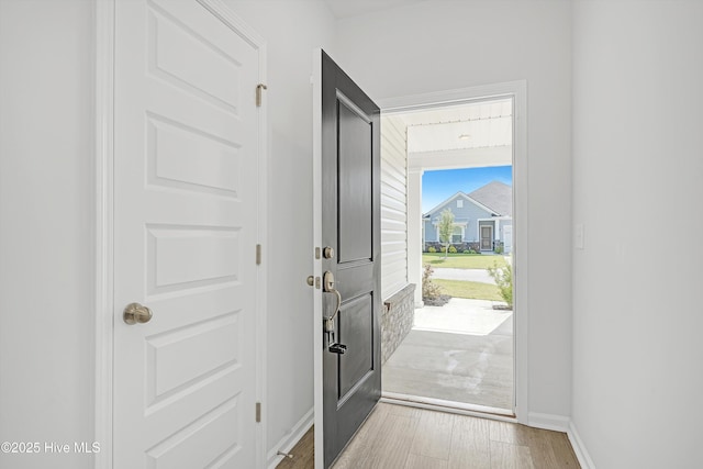 6437 Twinspur Ct SW, Ocean Isle Beach, NC 28469 - entrance foyer with baseboards and light wood-style floors
