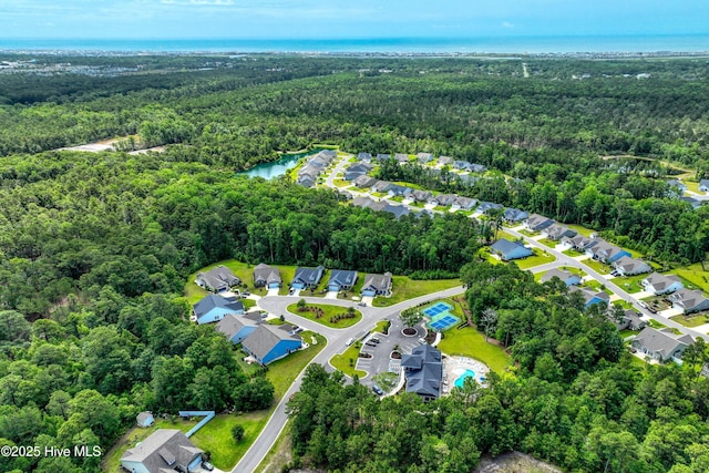6437 Twinspur Ct SW, Ocean Isle Beach, NC 28469 - aerial view of property and surrounding area with a forest and nearby suburban area