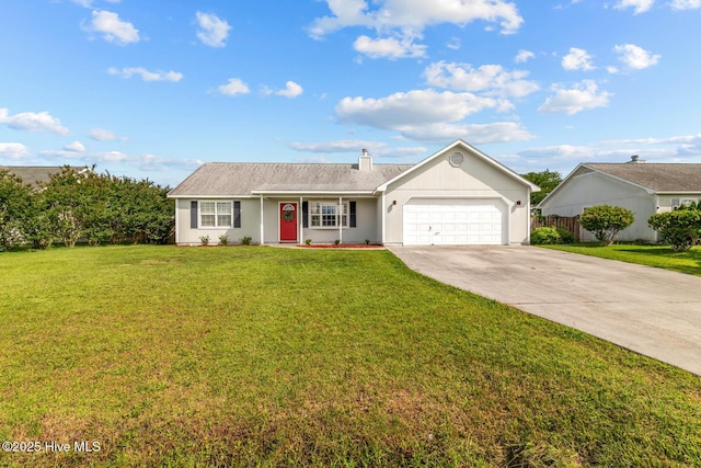 425 Dion Dr, Hubert, NC 28539 - single story home featuring a garage, driveway, a front yard, and a chimney
