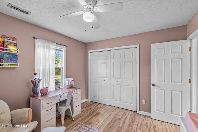 425 Dion Dr, Hubert, NC 28539 - office area featuring a ceiling fan, a textured ceiling, light wood-style flooring, and baseboards