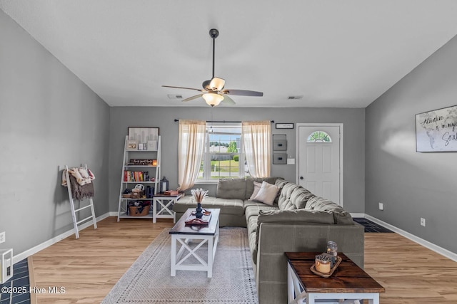 425 Dion Dr, Hubert, NC 28539 - living room with light wood-style flooring, ceiling fan, and baseboards
