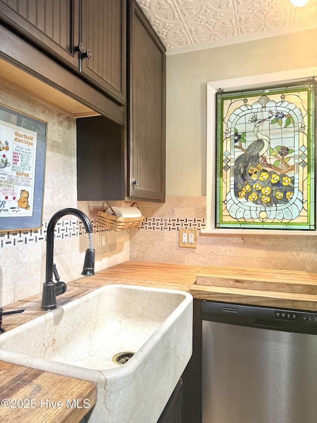2210 Klein Rd, Wilmington, NC 28405 - kitchen with dishwasher, a sink, wooden counters, tasteful backsplash, and dark brown cabinetry