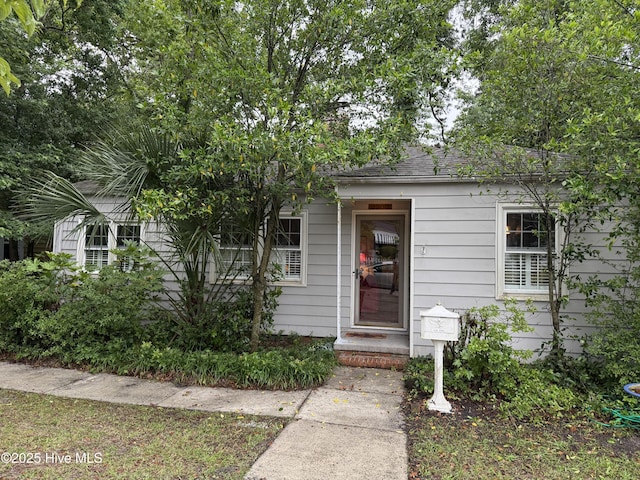 2210 Klein Rd, Wilmington, NC 28405 - doorway to property with a shingled roof
