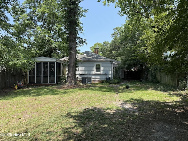 2210 Klein Rd, Wilmington, NC 28405 - view of yard with a sunroom and central AC