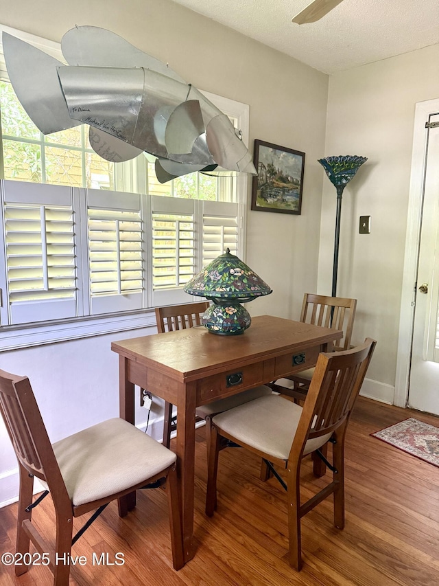 2210 Klein Rd, Wilmington, NC 28405 - dining area featuring wood finished floors, ceiling fan, and baseboards