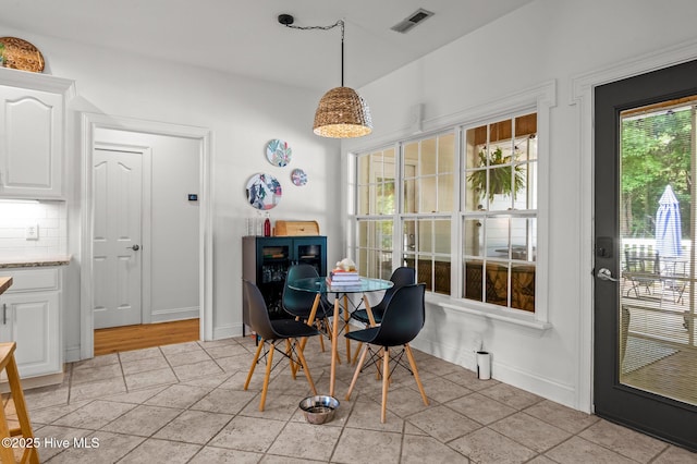 1682 Gores Landing Rd SW, Ocean Isle Beach, NC 28469 - dining room with baseboards