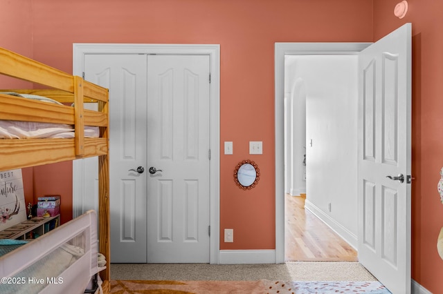 1682 Gores Landing Rd SW, Ocean Isle Beach, NC 28469 - bedroom with a closet and baseboards