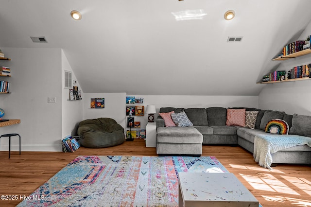 1682 Gores Landing Rd SW, Ocean Isle Beach, NC 28469 - living room with lofted ceiling, wood finished floors, baseboards, and recessed lighting