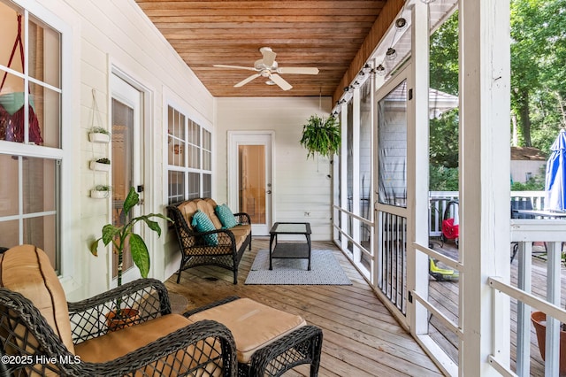 1682 Gores Landing Rd SW, Ocean Isle Beach, NC 28469 - sunroom with ceiling fan and an outdoor hangout area