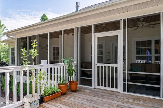 1682 Gores Landing Rd SW, Ocean Isle Beach, NC 28469 - wooden deck with a sunroom and a ceiling fan