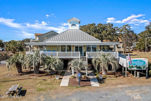 1682 Gores Landing Rd SW, Ocean Isle Beach, NC 28469 - view of property featuring stairway
