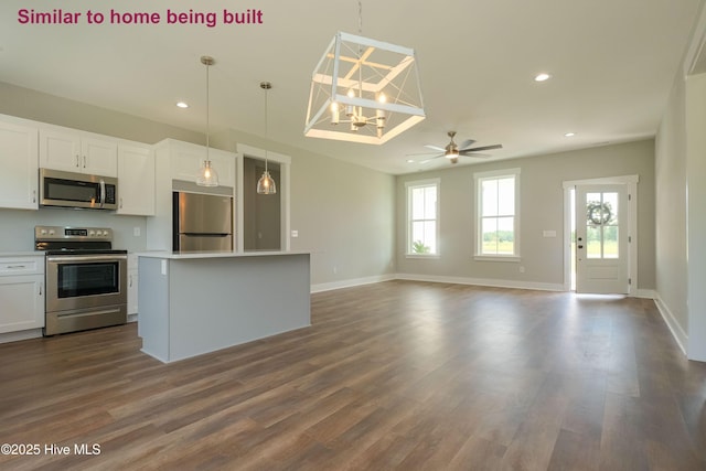 129 Bayview Trl, Edenton, NC 27932 - kitchen with stainless steel appliances, dark wood finished floors, white cabinets, and recessed lighting