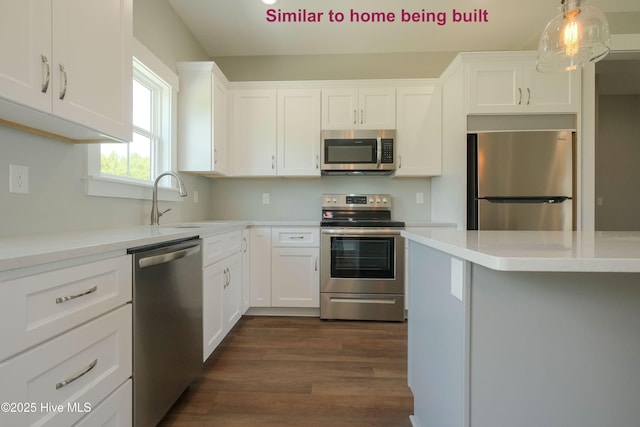 129 Bayview Trl, Edenton, NC 27932 - kitchen with appliances with stainless steel finishes, a sink, white cabinetry, light countertops, and dark wood-style flooring