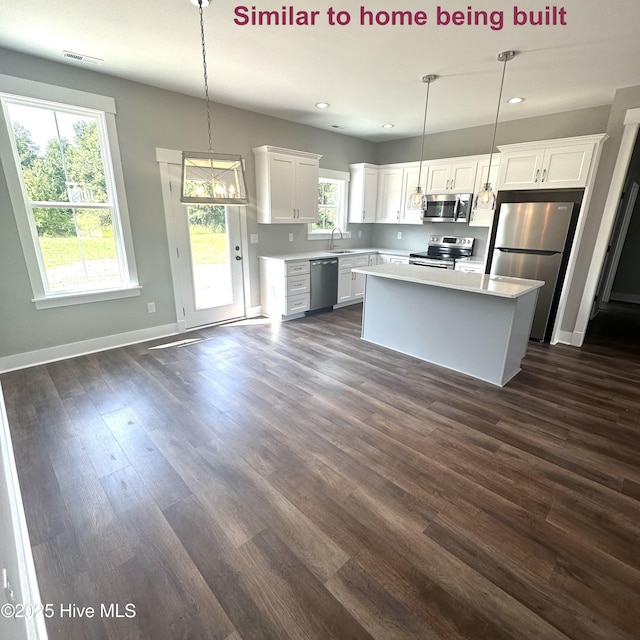 129 Bayview Trl, Edenton, NC 27932 - kitchen featuring stainless steel appliances, a sink, recessed lighting, light countertops, and white cabinets