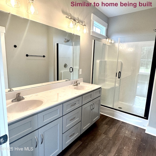 129 Bayview Trl, Edenton, NC 27932 - bathroom with wood finished floors, a stall shower, and double vanity