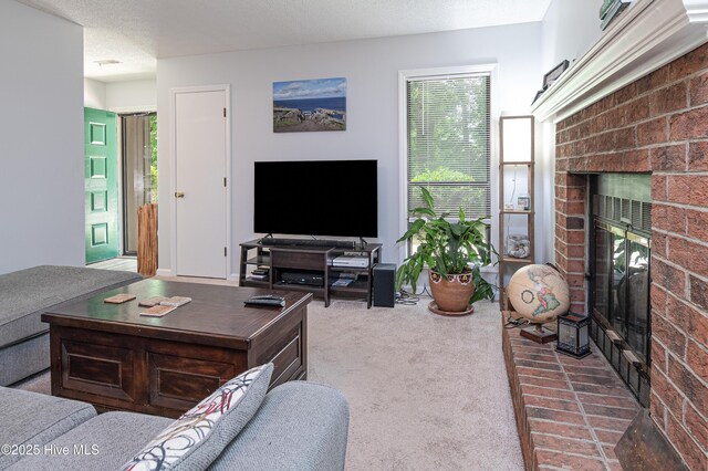 923 Persimmon Pl, Winterville, NC 28590 - living room with a brick fireplace and carpet