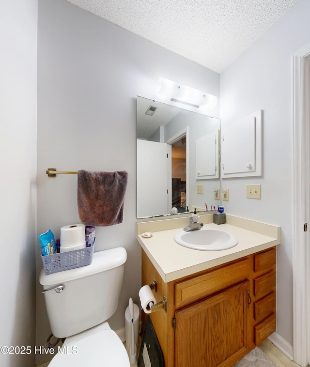 923 Persimmon Pl, Winterville, NC 28590 - bathroom featuring toilet, vanity, and a textured ceiling