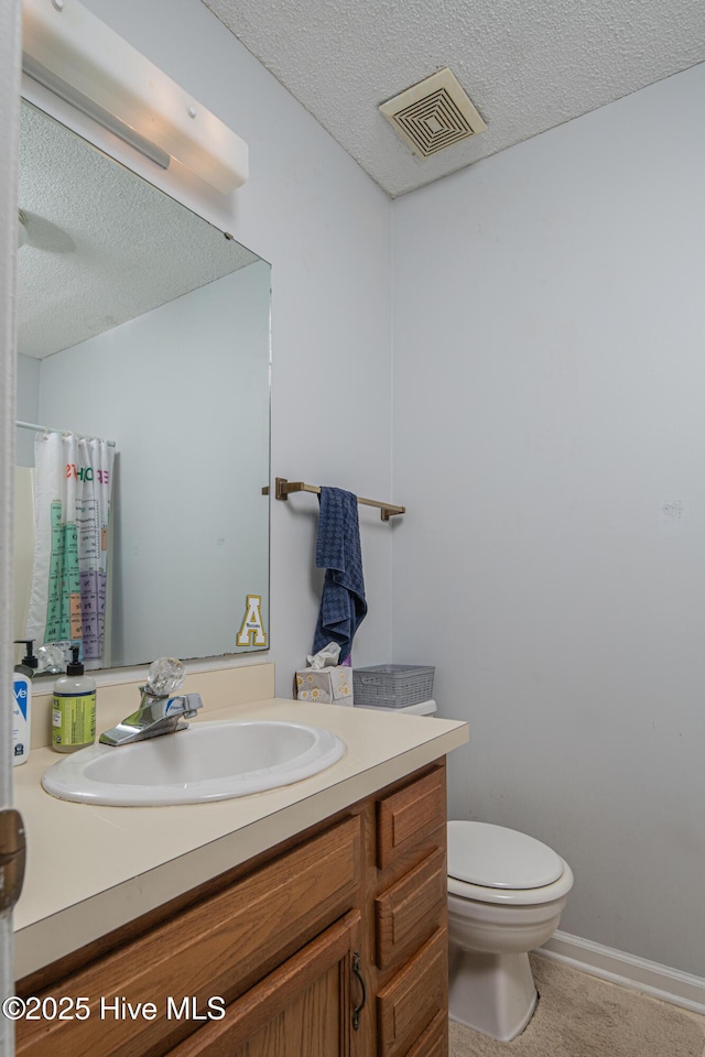 923 Persimmon Pl, Winterville, NC 28590 - bathroom with toilet, vanity, a textured ceiling, and curtained shower