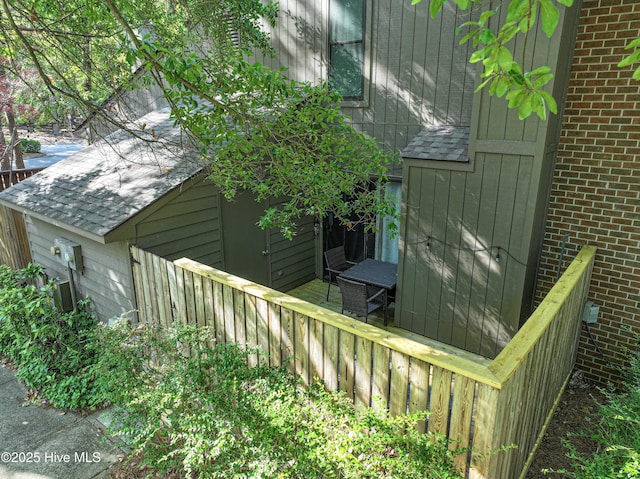 923 Persimmon Pl, Winterville, NC 28590 - view of home's exterior featuring brick siding and roof with shingles