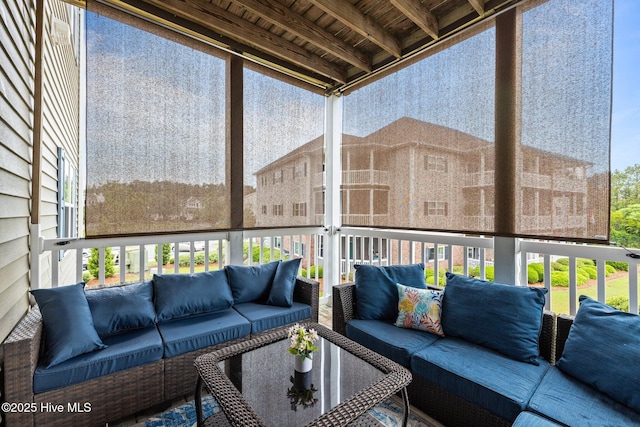 404 Penny Ln Unit F, Morehead City, NC 28557 - sunroom featuring an outdoor hangout area and healthy amount of natural light