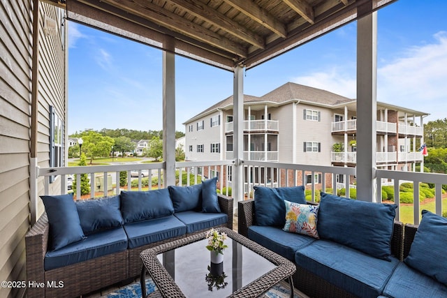 404 Penny Ln Unit F, Morehead City, NC 28557 - balcony featuring an outdoor living space