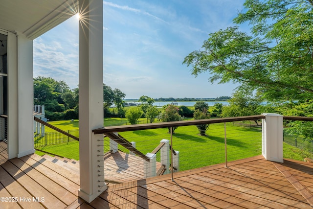1911 Middle Sound Loop Rd, Wilmington, NC 28411 - deck featuring a water view and a yard