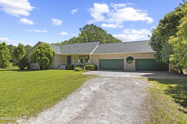 418 Grants Creek Rd, Jacksonville, NC 28546 - single story home featuring driveway, a front yard, brick siding, and an attached garage