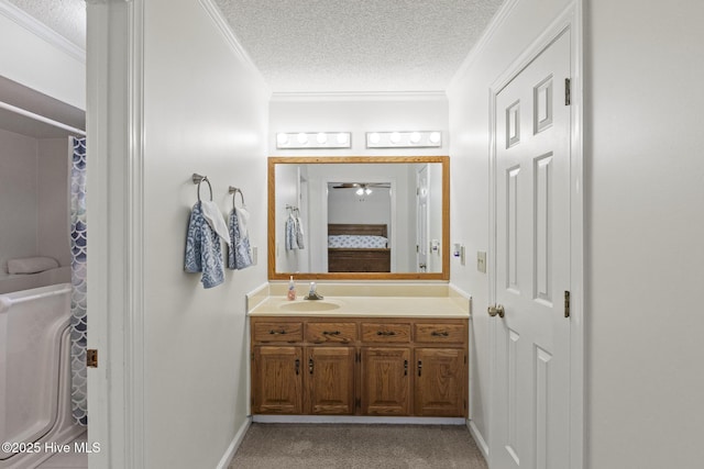 418 Grants Creek Rd, Jacksonville, NC 28546 - bathroom with vanity, a textured ceiling, ornamental molding, curtained shower, and baseboards