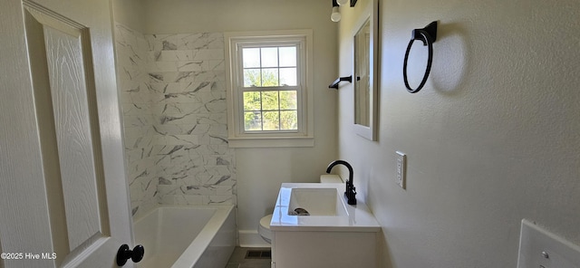 107 Carolina Ave, Clinton, NC 28328 - full bathroom featuring vanity, toilet, and tub / shower combination