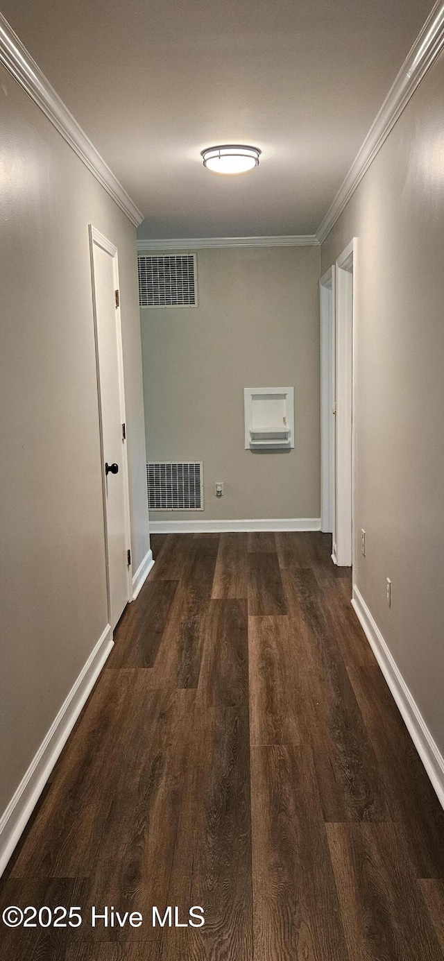 107 Carolina Ave, Clinton, NC 28328 - hallway featuring wood finished floors, ornamental molding, and baseboards