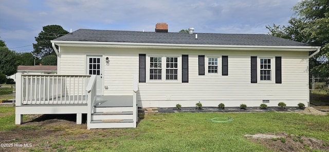 107 Carolina Ave, Clinton, NC 28328 - back of property with a wooden deck, a yard, a chimney, crawl space, and a shingled roof