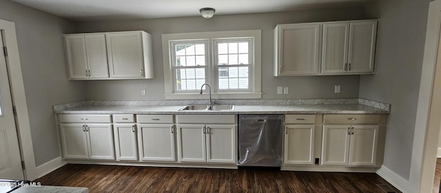 107 Carolina Ave, Clinton, NC 28328 - kitchen featuring dishwasher, a sink, dark wood finished floors, and light countertops
