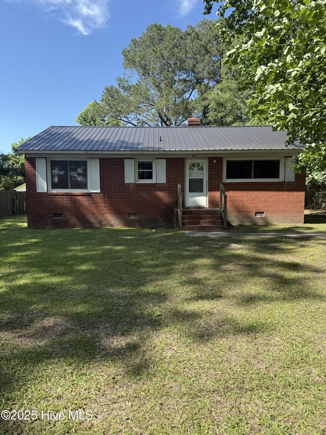 102 House St, Robersonville, NC 27871 - ranch-style home featuring crawl space, entry steps, metal roof, a front yard, and brick siding