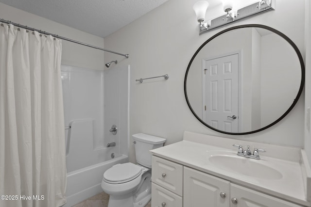 4109 Breezewood Dr Unit 204, Wilmington, NC 28412 - bathroom with vanity, shower / tub combo with curtain, toilet, a textured ceiling, and tile patterned flooring