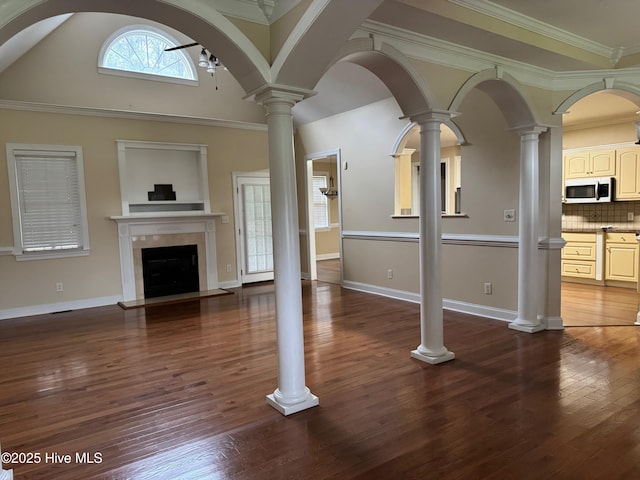 315 Hunters Creek Dr, Goldsboro, NC 27534 - unfurnished living room with a fireplace, dark wood-style floors, and baseboards