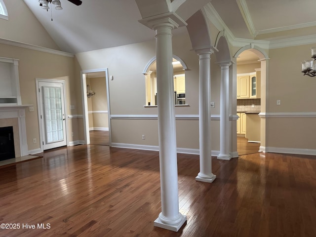 315 Hunters Creek Dr, Goldsboro, NC 27534 - unfurnished living room with ceiling fan, hardwood / wood-style floors, a premium fireplace, lofted ceiling, and crown molding