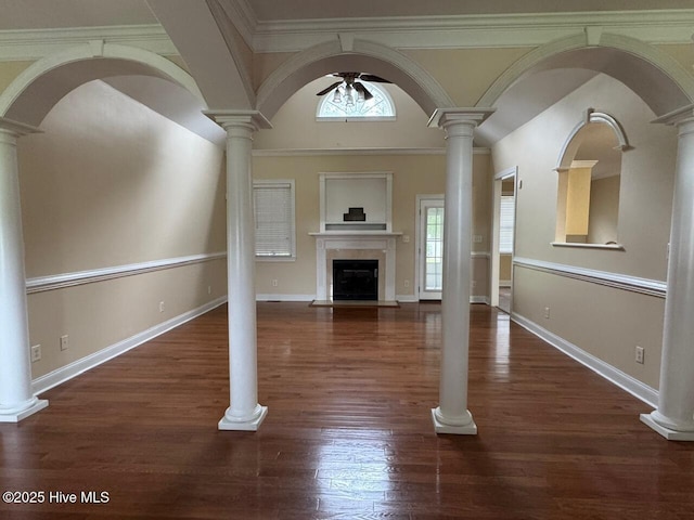 315 Hunters Creek Dr, Goldsboro, NC 27534 - unfurnished living room featuring a ceiling fan, a fireplace, wood finished floors, and baseboards