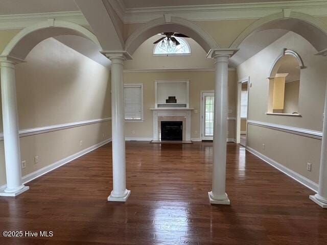 315 Hunters Creek Dr, Goldsboro, NC 27534 - unfurnished living room with a fireplace with flush hearth, ceiling fan, wood finished floors, and baseboards