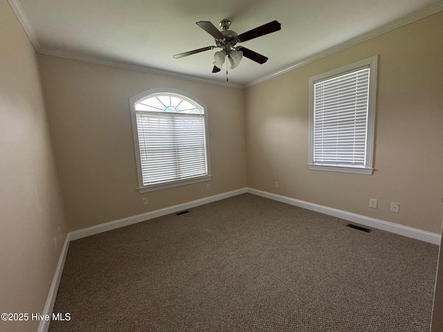 315 Hunters Creek Dr, Goldsboro, NC 27534 - carpeted empty room with crown molding, baseboards, and ceiling fan