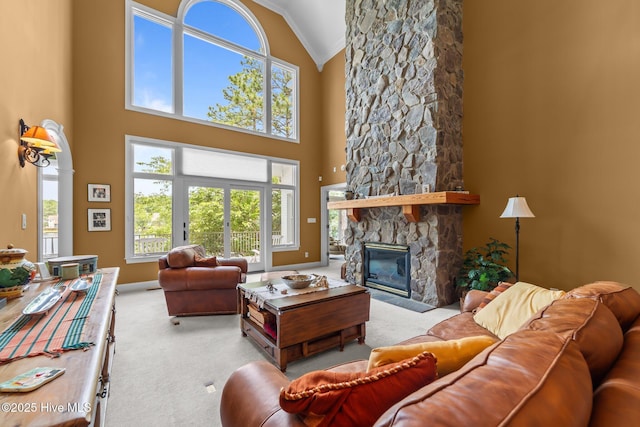 118 Douglas Dr, West End, NC 27376 - carpeted living room featuring ornamental molding, high vaulted ceiling, and a fireplace