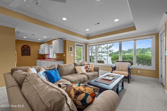 118 Douglas Dr, West End, NC 27376 - living area with crown molding, light colored carpet, a ceiling fan, recessed lighting, and a raised ceiling