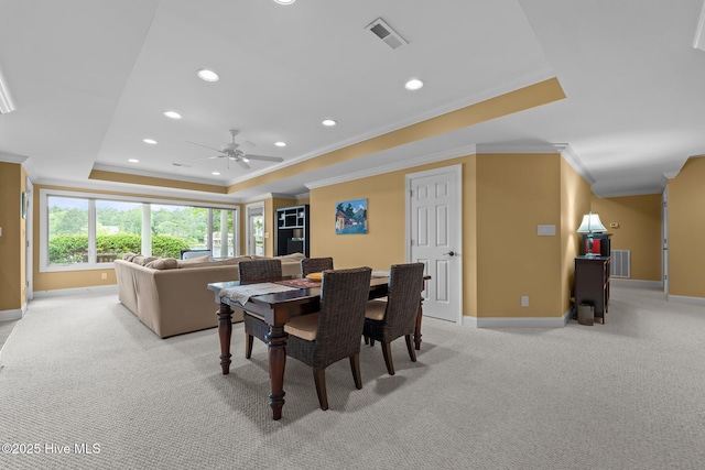118 Douglas Dr, West End, NC 27376 - dining space with a raised ceiling, crown molding, light colored carpet, recessed lighting, and ceiling fan