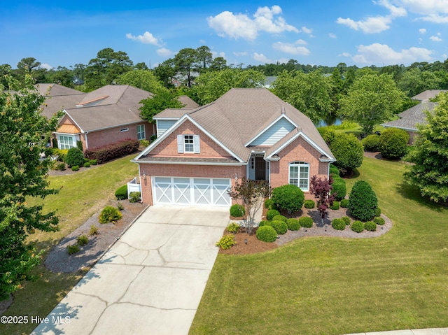 4239 Ashfield Pl, Southport, NC 28461 - traditional-style home with driveway, brick siding, and a front lawn