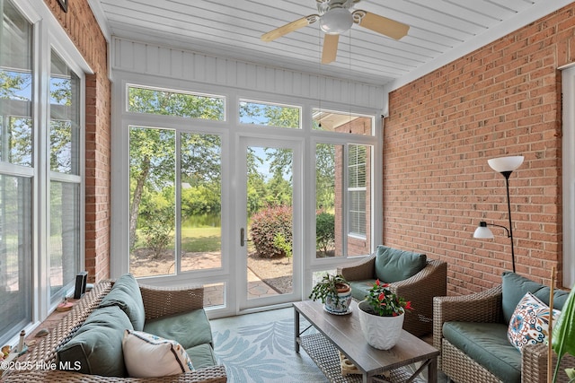 4239 Ashfield Pl, Southport, NC 28461 - sunroom / solarium with a ceiling fan, healthy amount of natural light, and an outdoor hangout area