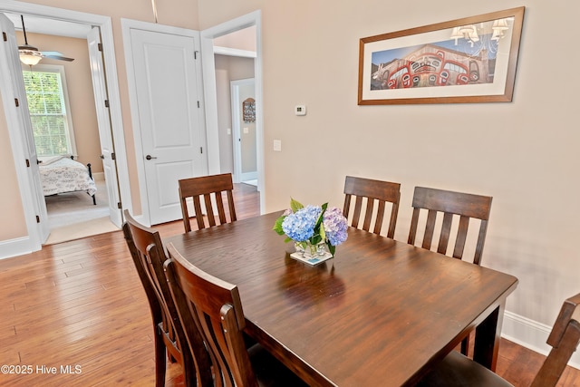 4239 Ashfield Pl, Southport, NC 28461 - dining room featuring wood finished floors, baseboards, and ceiling fan