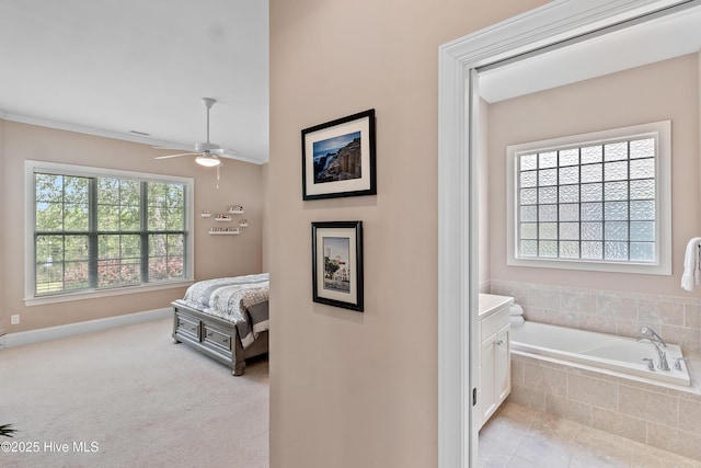 4239 Ashfield Pl, Southport, NC 28461 - unfurnished bedroom featuring baseboards and a ceiling fan