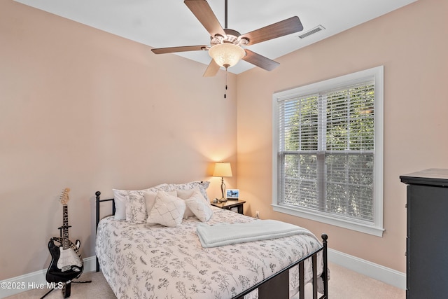 4239 Ashfield Pl, Southport, NC 28461 - carpeted bedroom featuring baseboards and a ceiling fan