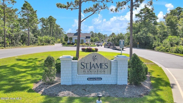 4239 Ashfield Pl, Southport, NC 28461 - community sign with a lawn