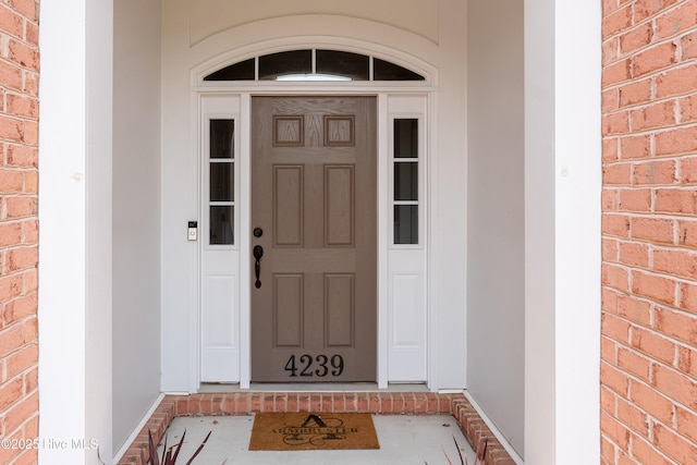 4239 Ashfield Pl, Southport, NC 28461 - property entrance with brick siding