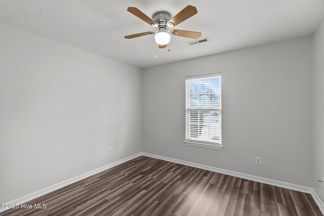 1428 Forest Hill Dr, Leland, NC 28451 - unfurnished room with dark wood-style floors, baseboards, and ceiling fan